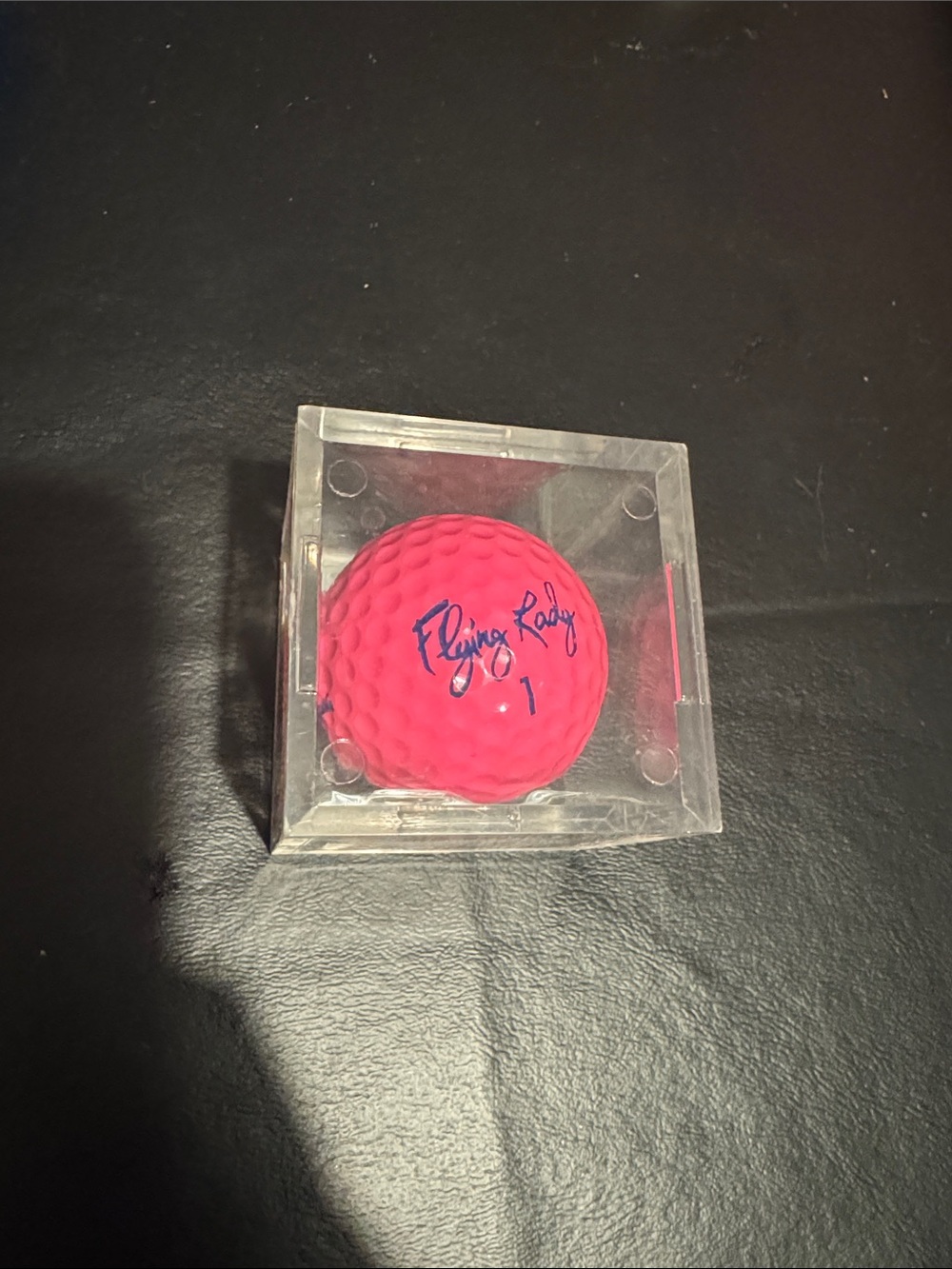Pink flying lady golf ball in case